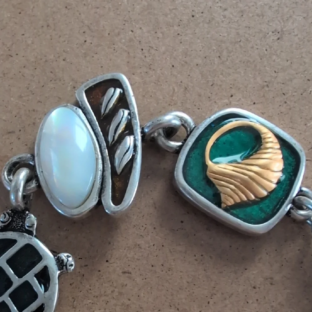 Artisan Silver and Gold Charm Bracelet